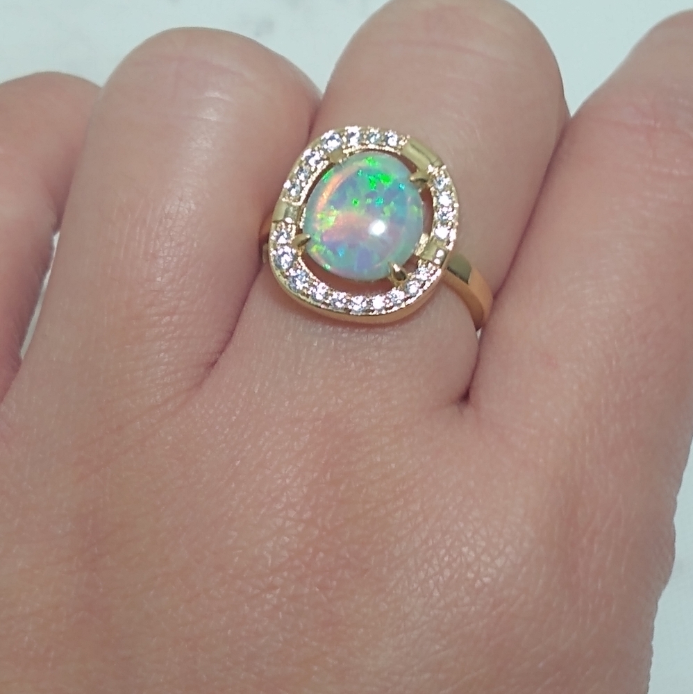 Elegant Gold Opal Ring with Diamond Accents - Picture 2 of 14